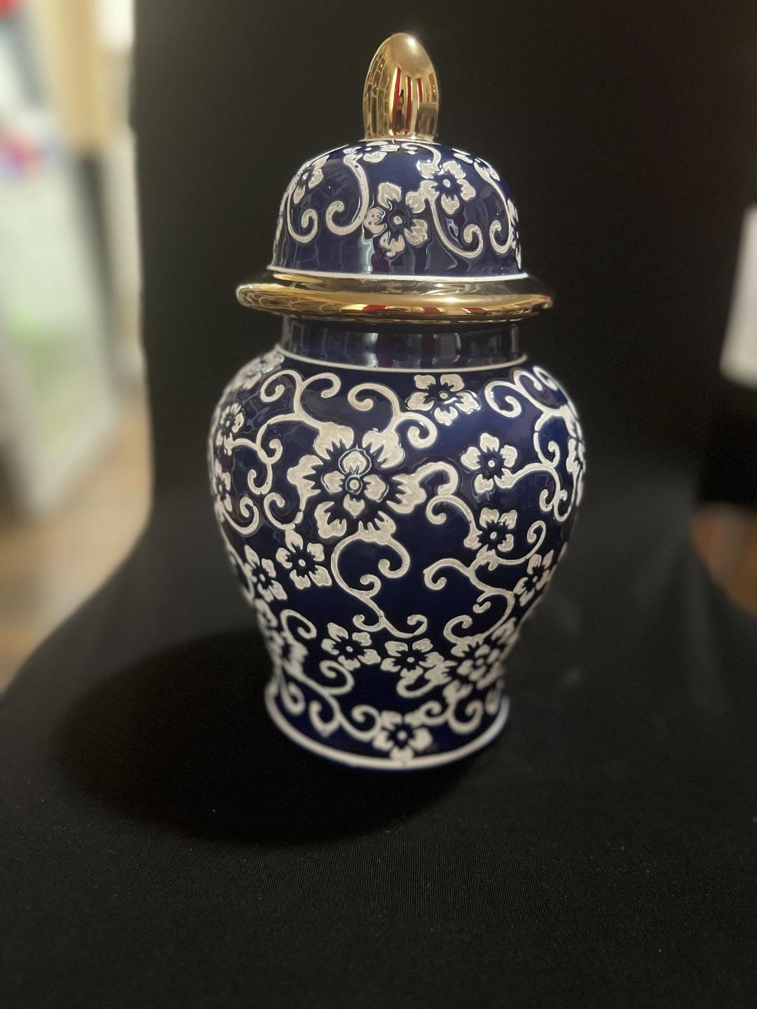 Blue,white & gold sopera flower design.